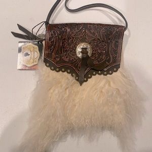 NWT Montana silversmith Sherpa tooled leather small cross body purse.